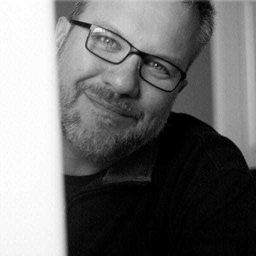 Headshot of Deep River Digital founder Roman Schauer.